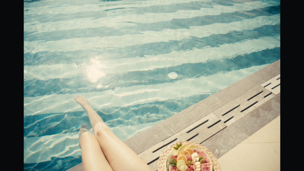 Cinematic frame from a luxury beachfront hotel in Crete by The Film Tailors, showcasing Alai Crete Resort and Mediterranean lifestyle