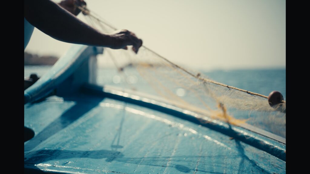 Cinematic frame from Alai Crete Resort filmed by The Film Tailors, capturing beachfront views and crystal clear Mediterranean waters